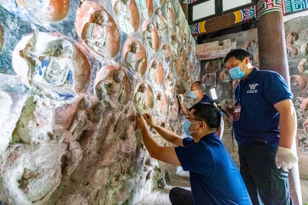 小佛灣修復(fù)現(xiàn)場。大足區(qū)委宣傳部供圖