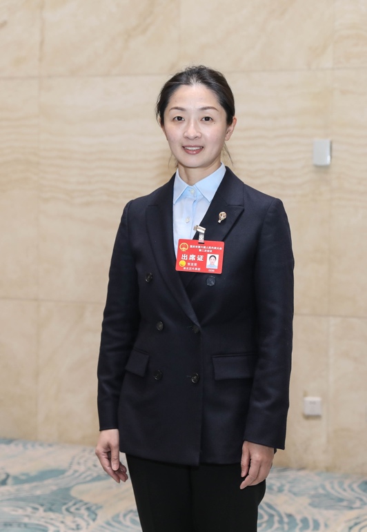 重慶市人大代表、重慶市羽毛球?qū)I(yè)隊(duì)（渝北隊(duì)）總教練張亞雯。受訪者供圖